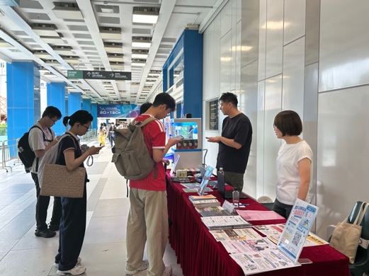 Students and teachers at the Language Centre information tables.